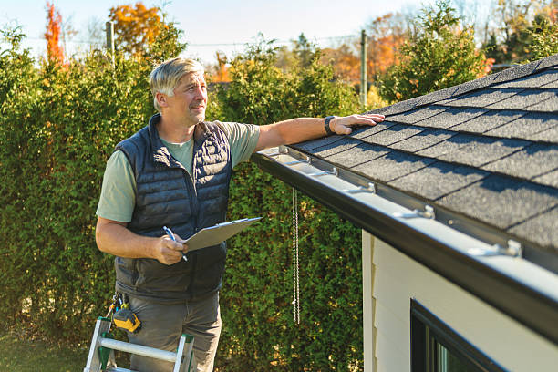 Professional Emergency Roof Repair technician working in Hadley, NY